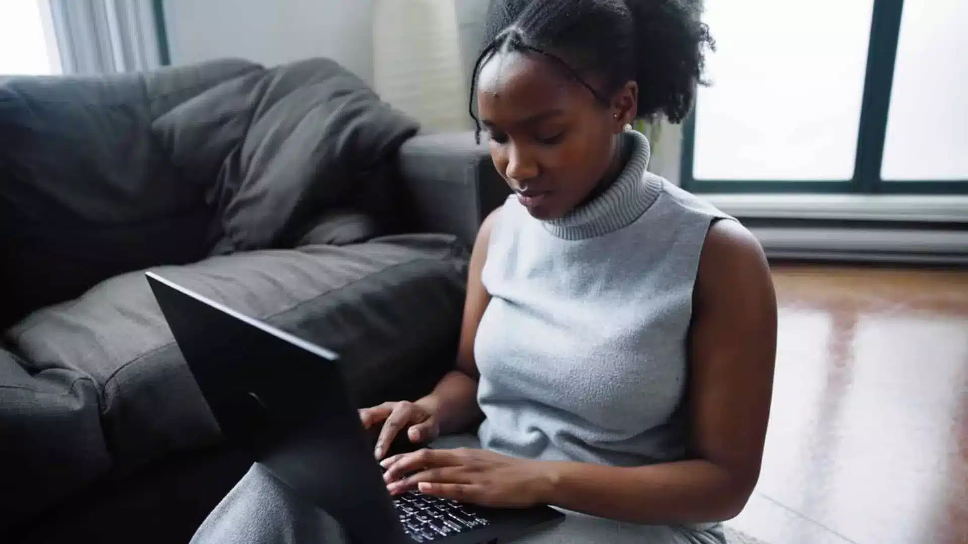 Girl studying for the k53 learners licence test in the comfort of her own home